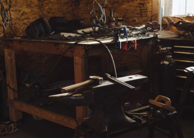 a workshop with a lot of tools and equipment